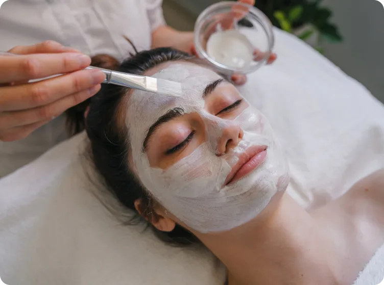 person getting a facial mask